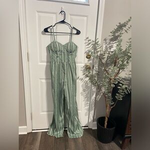 Jumpsuit size large green white striped with padded support like new